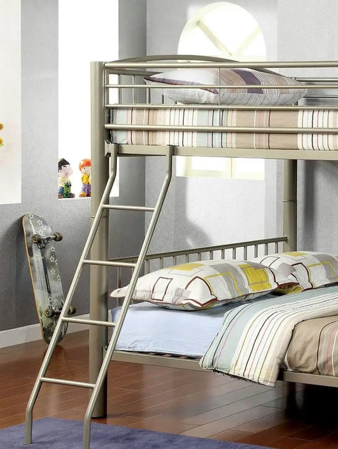 Full Over Full Metal Bunk Bed With Movable Ladder And Top Bed Rails Converts Into Two Separate Beds Beefy Heavy Duty Steel Frame In Metallic Grey Finish Built For Space Saving Sleep And Everyday Family Comfort showing top and bottom bedding with ladder angled on wooden floor.