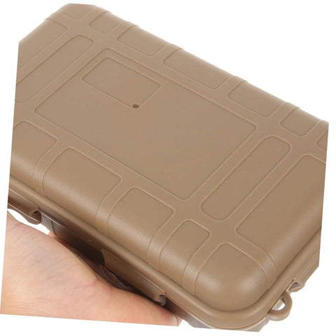 Rugged Outdoor Survival Storage Case Built Tough Shockproof Tool Box for camping, hiking shown in hand, closed view