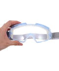 Heavy Duty Polycarbonate Safety Glasses With High Clarity Blue Lens Side Shields For Industrial Construction And Lab Work held in hand.