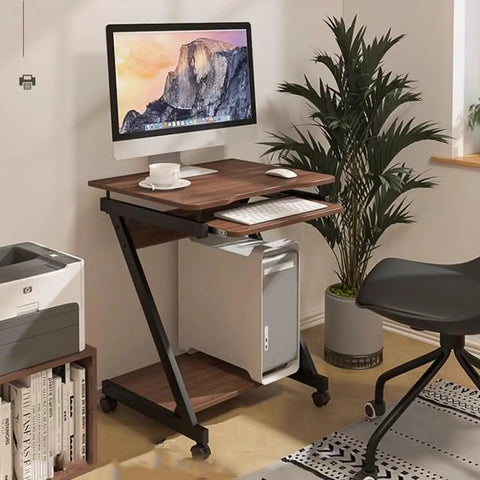 Cute standing desk with keyboard tray and computer setup for multi-use home office, featuring smooth adjustable height.