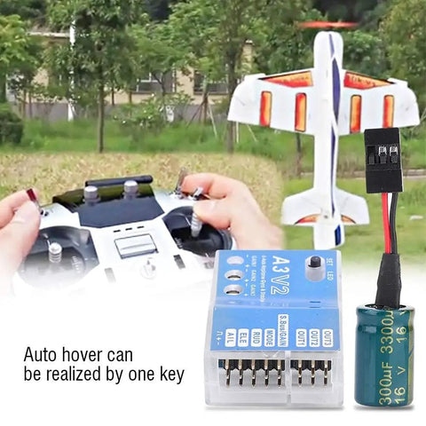 F50A 3 Axis Gyro A3 V2 Flight Controller with RC airplane, remote control, and auto hover feature in a park setting.