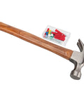 Hammer from 107 Piece Home And Auto Tool Set with claw design and wooden handle next to a box of colorful wall plugs