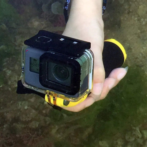 Underwater view of Waterproof Dive Housing Case For GoPro Hero 5 6 7 Black 45 Meter Underwater Protection with hand holding camera