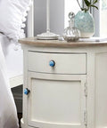 Marble Pattern Cabinet Knobs 4 Pack Round Single Hole Drawer Pulls For Kitchen Cupboards And Bedroom Drawers on a nightstand.