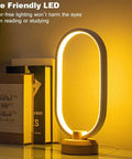 Modern Ellipse LED Desk Lamp With Wood Accent, dimmable warm white night light on nightstand, cozy vibes lighting with books