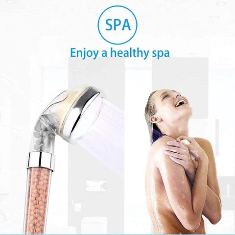 Led Shower Head With Hose And Arm Bracket Delivers High Pressure Filtration For Dry Skin And Hair Loss Handheld Design With Chlorine Removal 7 Color Changing Lights Cyclically And Water Saving For Spa Like Comfort in use in a spa-like bathroom