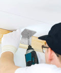 Person installing heavy duty 40 piece metal corner braces L brackets 2x2 inch for wood furniture home projects 90 degree right angle with drill