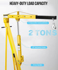 Front view of yellow 2-ton shop crane engine hoist with 6 steel casters and hydraulic pump