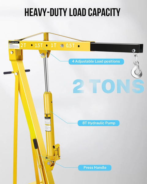 Front view of yellow 2-ton shop crane engine hoist with 6 steel casters and hydraulic pump