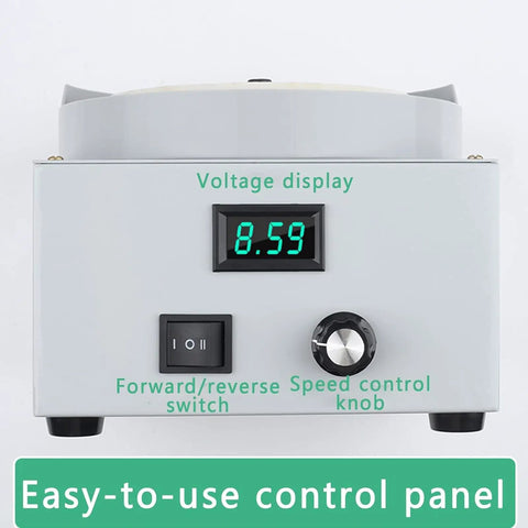 Rock Solid Wet Bench Grinder And Variable Speed Electric Sander With Three Diamond Grinding Discs control panel displaying voltage and speed settings.