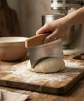 Heavy Duty Stainless Steel Dough Cutter And Bench Scraper Kitchen Essential For Nailing Cookie Dough Pastry Pie Crusts, cutting dough on wooden board.