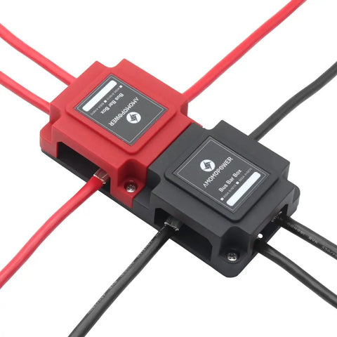Built Tough 400 Amp Bus Bar Power Distribution Block For 12V And 48V Systems With Eight M8 Studs, featuring red and black wiring.