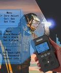 Hand holding a 4 Gas Portable Monitor With Rechargeable Battery And LCD Display Detects H2S O2 CO And LEL Four Gas Detector