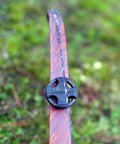 Close-up of a bow with Low-Profile Recurve Dampener Kit For Recurve And Youth Solid Limb Compound Bows, reducing vibration.