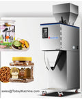 Heavy Duty Ground Coffee Weigh And Fill Machine Featuring Smooth Vibrating Feed Hopper Designed To Make Commercial Bagging A Straight Up Breeze For Local Roasters Seeking Foolproof Automation Daily, with jars of snacks.
