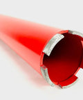 End view of a red 2.5-inch diamond wet core drill bit with segmented edges