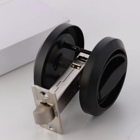 Sleek Stainless Steel Low Profile Door Knobs With Butter Smooth Nonlocking Flat Handle And Hidden Recessed Cup Shape Fast Mount Pocket Entry Handle Set Includes Black Chicago Screws For Rock Solid Grip, showing detailed handle design and mechanism.