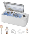 Quick Grab 50 Khz Ultrasonic Cleaner With Three Timer Settings For Bling Glasses Watches Dentures And Razors To Keep Your Daily Carry Fresh Without Any Drama Or Excess Mess Around Your Sink Area, featuring glasses in water.