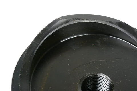 Close-up of 3-1/2 Inch Deep Draw Conduit Punch Die for Hydraulic Knockout Driver, 13 Ton Punch, showing threaded center and metal edge.