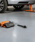 Pro Grade Crankshaft Pulley Install Tool And Harmonic Balancer Puller Kit For Engine Repair on garage floor near car.