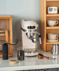 Compact Semi Automatic Coffee Maker With Built In Bean Grinder And Fast Milk Frother Tailored For Home Bars brewing espresso on a countertop.