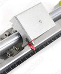 Close-up of Rock Solid Linear Stage Actuator With SFU1605 Ball Screw and manual guide, showing laser handwheel and ruler detail.