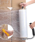 Heavy Duty Chrome Steel Pallet Stretch Film Dispenser With Top Shelf Ergonomic Grip and quick cut, wrapping a box.