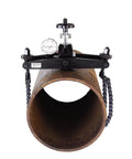 Pro Grade Digital Hardness Tester With Portable Chain Clamp Durometer positioned on a large metal pipe for precise measurements.