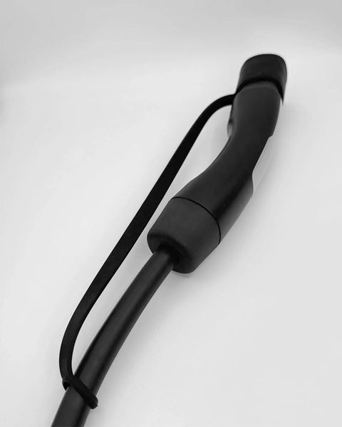 Kickin Dust And Grime Outta Your Setup With This Plush Waterproof Silicone Cover Fits Tesla Nacs Ports Dead Nuts Easy Snap Design close-up view showing flexible rubber material.