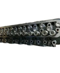 Premium Quality Top Shelf 6D34 Cylinder Head With Full Gasket And Valve Kit For Mitsubishi MG230 Motor Grader side view showing valve train detail.