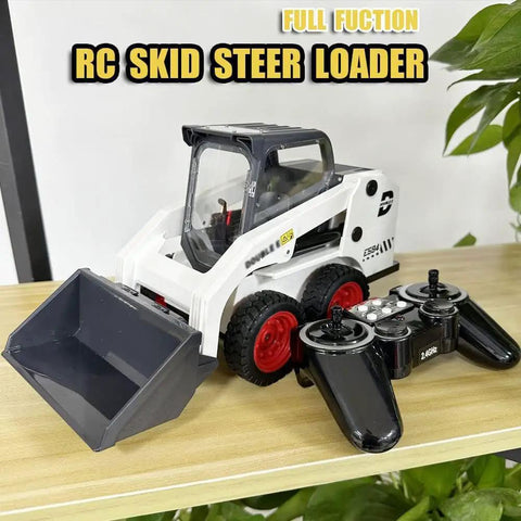 One Fourteenth Scale RC Skid Steer Loader With Eleven Channel Full Function Remote displayed on a wooden surface