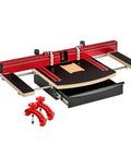 Dead Nuts Straight 36 By 36 Inch Drill Press Table Master System with adjustable fence and red clamps for precision drilling.