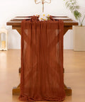 Rustic Terracotta Table Runner Hand Dyed From Breathable Cheesecloth bringing hella beautiful vibes to your big day setup on wooden table.
