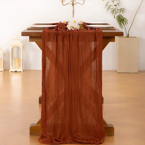Rustic Terracotta Table Runner Hand Dyed From Breathable Cheesecloth bringing hella beautiful vibes to your big day setup on wooden table.