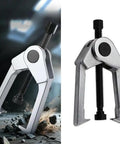 Smooth Operator Two Jaw Wheel Hub Bearing Puller in action, rugged alloy construction, spans 0 to 5-1/8 inches for gear removal.