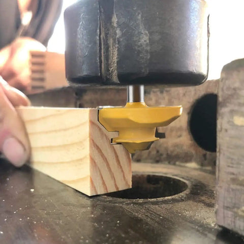 Heavy Duty Pro Grade Carbide Lock Miter Router Bit 45 Degree Cut 3/4 Inch Cutting Height 1/4 Inch Shank in action on wood