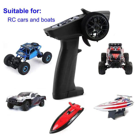 Turbo Racing 91803G VT 2.4GHz RC Transmitter with 3CH Radio and 4CH Receiver alongside RC cars and boats, black