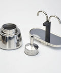 Rock Solid Stainless Steel Stovetop Espresso Maker With Dual Spout brewing parts including base, filter, and spout.