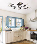 Eight Light Sputnik Chandelier In Oil Rubbed Bronze, Vintage Mid Century Semi Flush Mount Ceiling Fixture in a kitchen