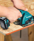 Person using Cordless 12V Max Circular Saw Kit With Three-Eighths Inch Blade, 1500 RPM, One-Inch Depth, Bevel Cuts on plywood