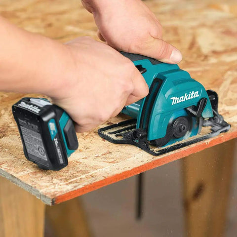 Person using Cordless 12V Max Circular Saw Kit With Three-Eighths Inch Blade, 1500 RPM, One-Inch Depth, Bevel Cuts on plywood