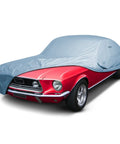 Ford Mustang 1964 1965 1966 1967 1968 Custom Car Cover For All Weather Waterproof Outdoor Indoor UV Sun Protection Exterior Weatherproof Fit For Classic Pony Car partially covering a classic red Mustang.