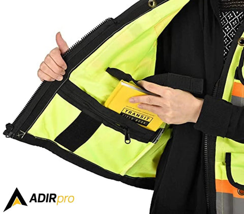 Straight Up Durable High Visibility Class Two Safety Vest With Blazing Reflective Tape And Secure Zippered Pockets For Construction Crews And Surveyors In Fluorescent Yellow showing zippered pocket with notebook.