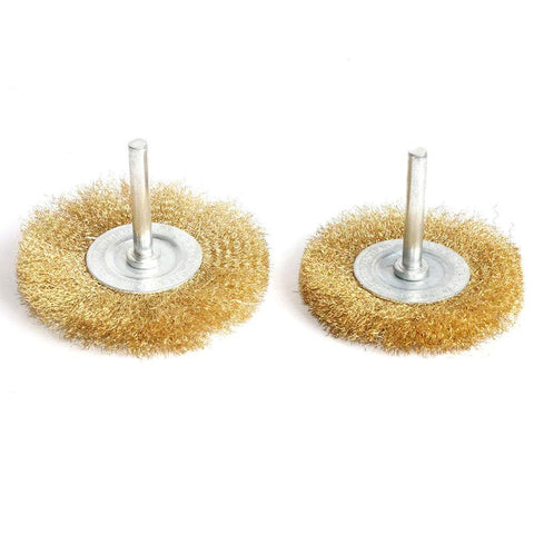 Two brass wire wheel brushes with 1/4-inch shanks for drill