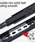 Close-up of full extension drawer runners and slides with quiet smooth ball bearing operation, showing metal construction and mounting holes.