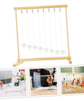 Snake Shape Pendulum Energy Conservation Model Kit For DIY Science Projects with wooden frame and hanging pendulums for students.