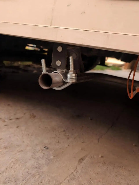 Beefy Heavy Duty Universal Exhaust Hanger Kit with heat resistant pads on vehicle pipe, easy install, vibration dampening