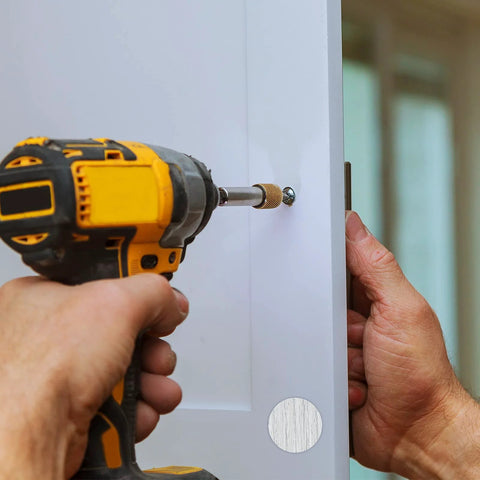 Wood Grain Adhesive Screw Hole Cover Sticker Set, 648 Pieces, 12 Colors, being installed on a white cabinet