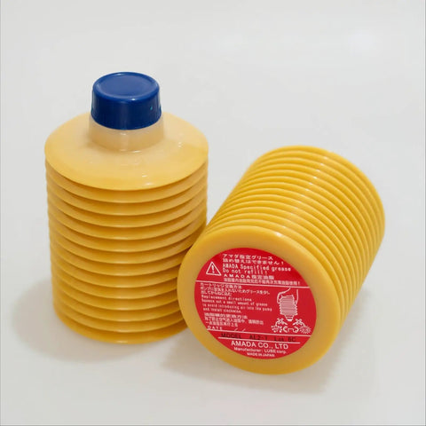 AL2-7 Injection Molding Machine Lubricant Grease For CNC Punch And Laser Cutting Gear 700ml shown in yellow containers