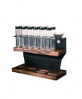 Premium Two Tier Coffee Bean Storage Rack With Wooden Base And Twelve Clear Glass Jars Featuring Air Release Vents For Crisp Freshness And Top Shelf Kitchen Counter Organization Straight Fire Setup, dual tier with funnel.